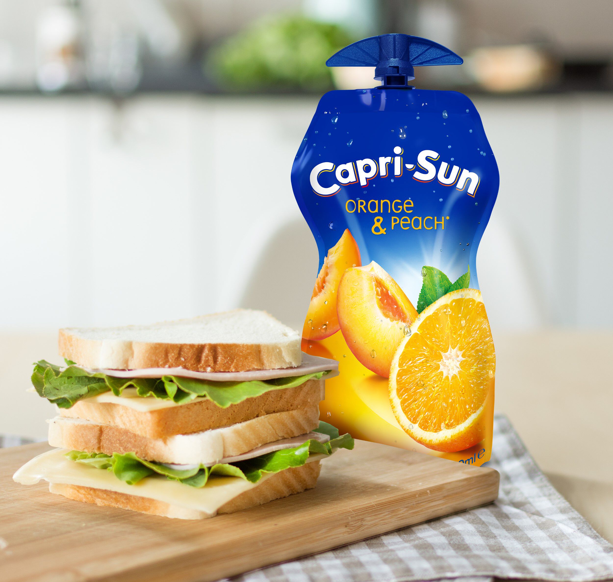 REFRIGERANTE CAPRI-SUN SEM G&Aacute;S LARANJA E PESSEGO 330ML image number 2